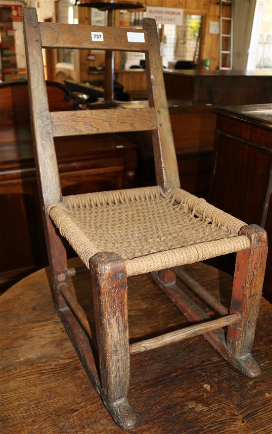 Rope seated ladder back rocking chair